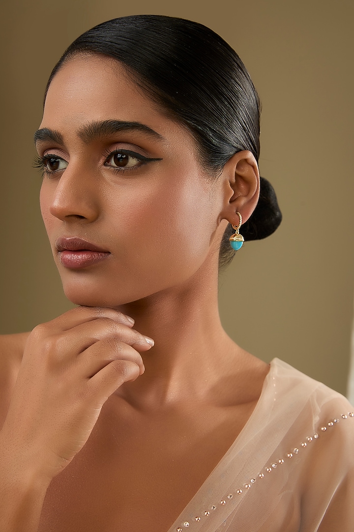 Gold Finish Cubic Zirconia & Blue Crystal Dangler Earrings by Halo Jewelers at Pernia's Pop Up Shop