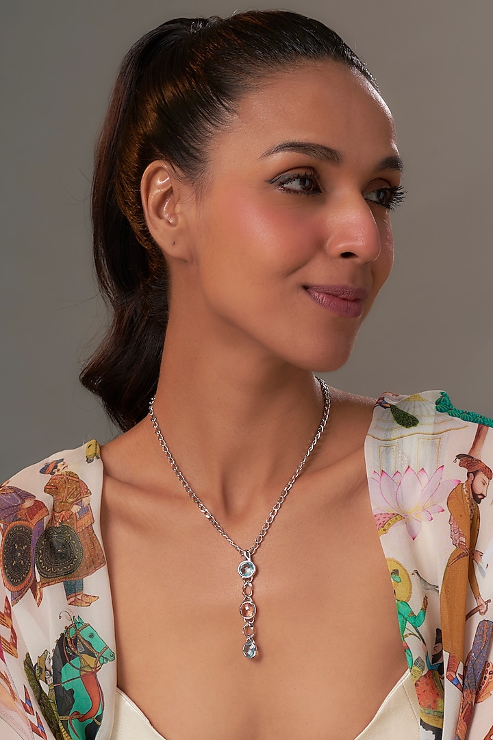 White Rhodium Finish Aquamarine & Peach Crystal Pendant Necklace by Halo Jewelers at Pernia's Pop Up Shop