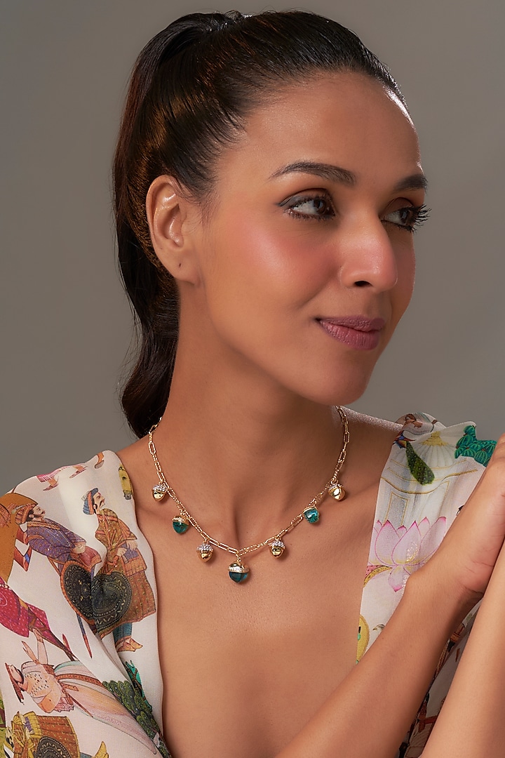 Yellow Gold Finish Aquamarine Crystal & Cubic Zirconia Pyramadial Necklace by Halo Jewelers at Pernia's Pop Up Shop