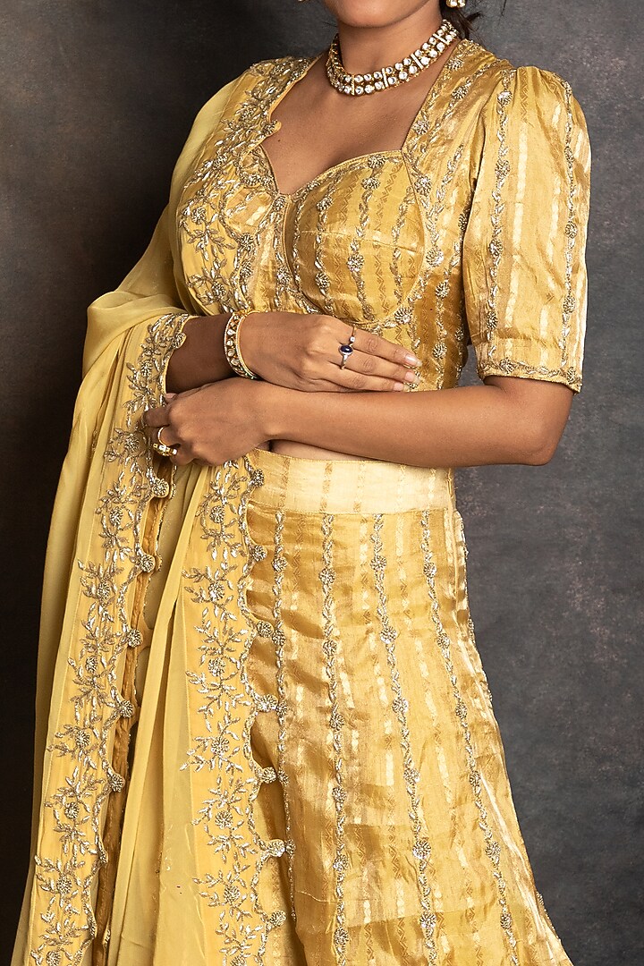 Golden Tissue Embroidered Wedding Lehenga Set by LABEL KIARSH at Pernia's Pop Up Shop