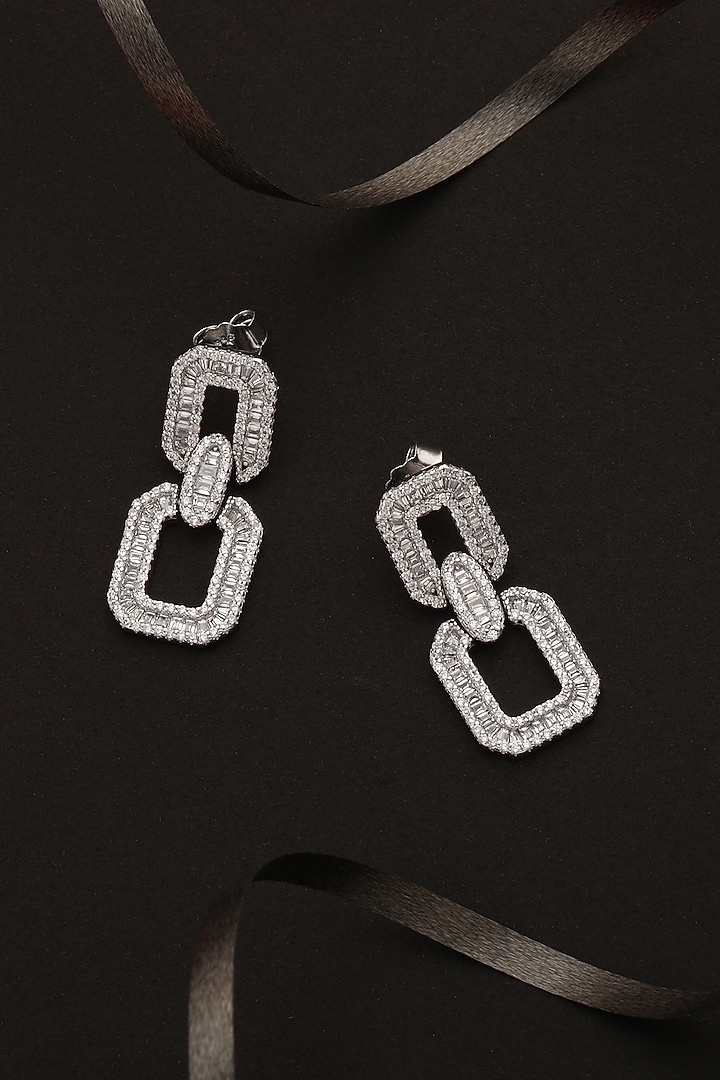 White Finish Cubic Zirconia Dangler Earrings In Sterling Silver by HALKI FULKI at Pernia's Pop Up Shop
