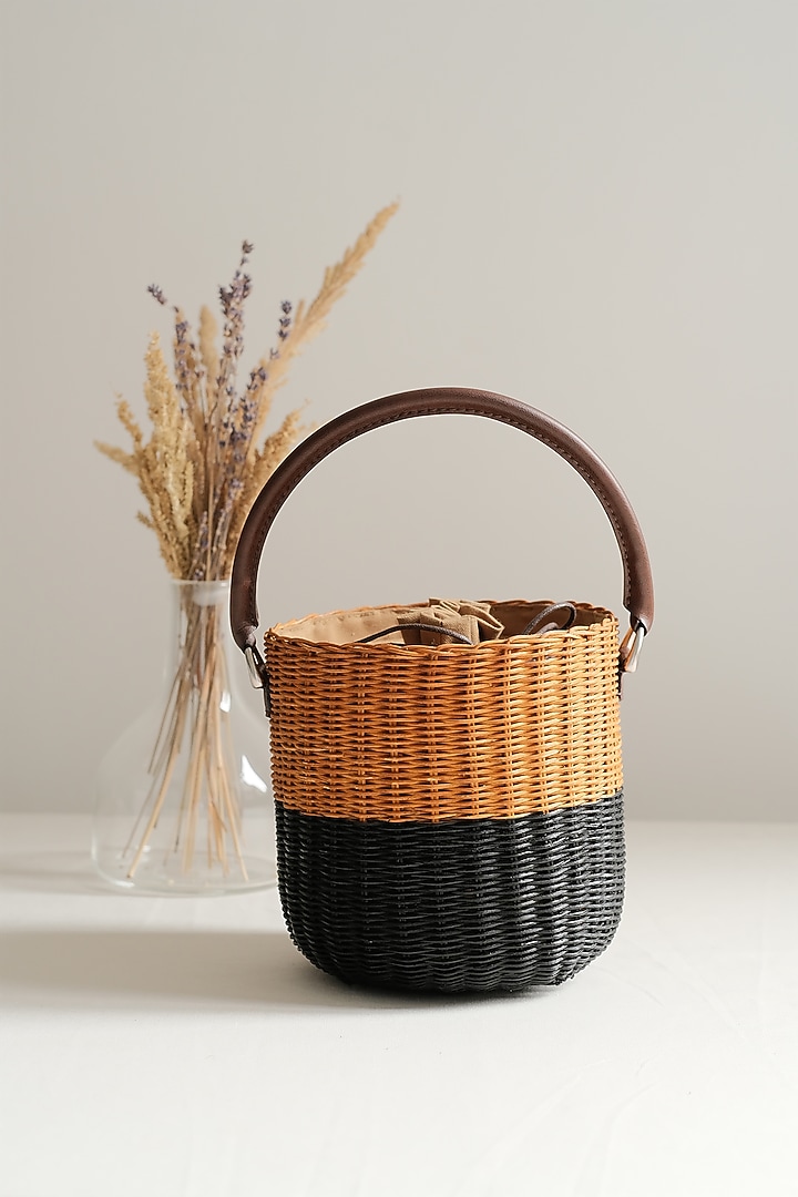 Natural & Black Handwoven Bucket Sling by Hans (Handmade) at Pernia's Pop Up Shop