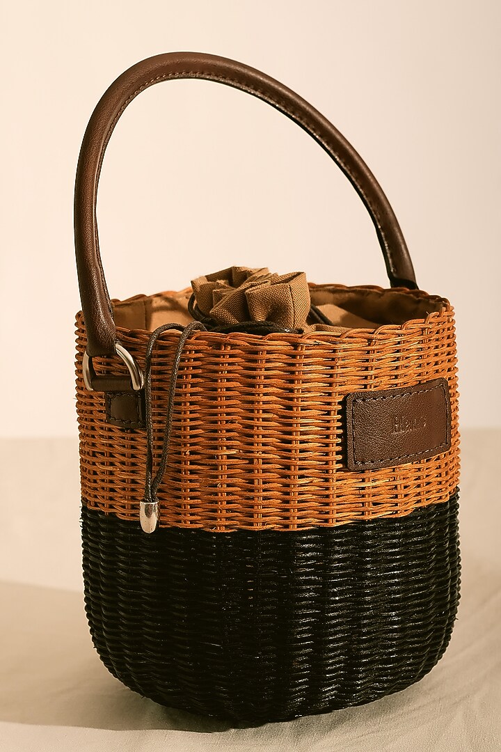 Natural & Black Handwoven Bucket Sling by Hans (Handmade) at Pernia's Pop Up Shop