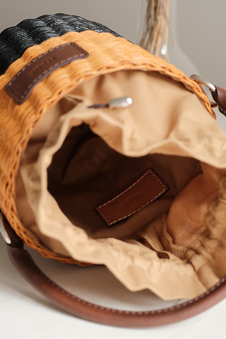 Natural & Black Handwoven Bucket Sling by Hans (Handmade) at Pernia's Pop Up Shop