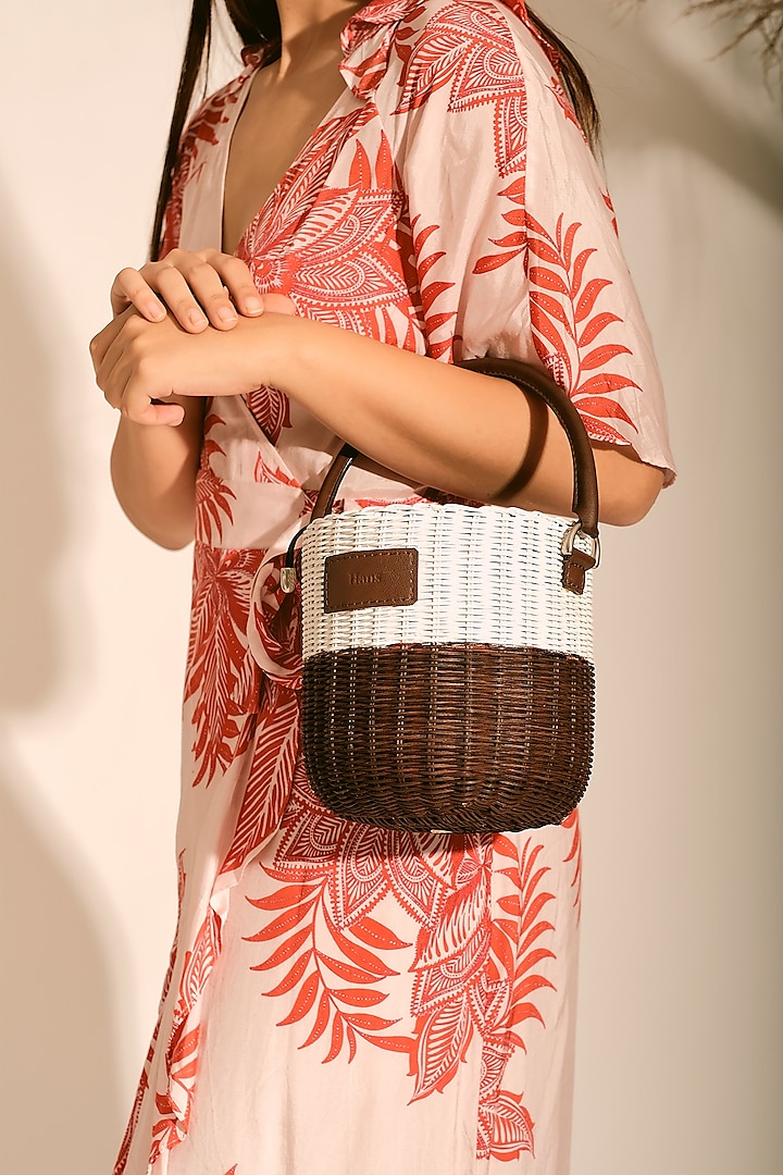 White & Brown Handwoven Bucket Sling by Hans (Handmade) at Pernia's Pop Up Shop