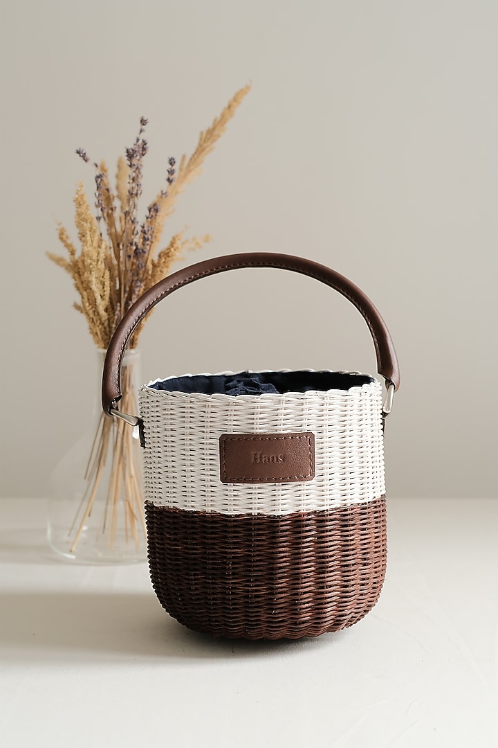White & Brown Handwoven Bucket Sling by Hans (Handmade) at Pernia's Pop Up Shop