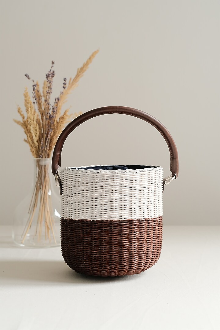 White & Brown Handwoven Bucket Sling by Hans (Handmade) at Pernia's Pop Up Shop