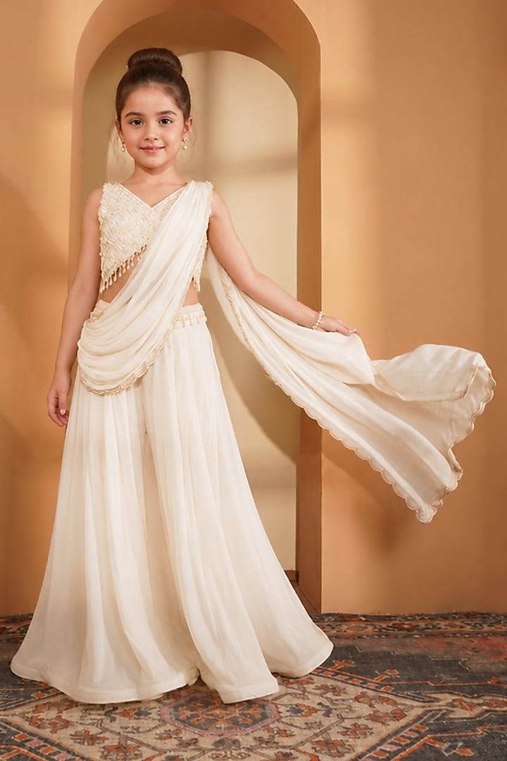 Ivory Crepe Pearl Embroidered Draped Sharara Set For Girls by Harmony at Pernia's Pop Up Shop