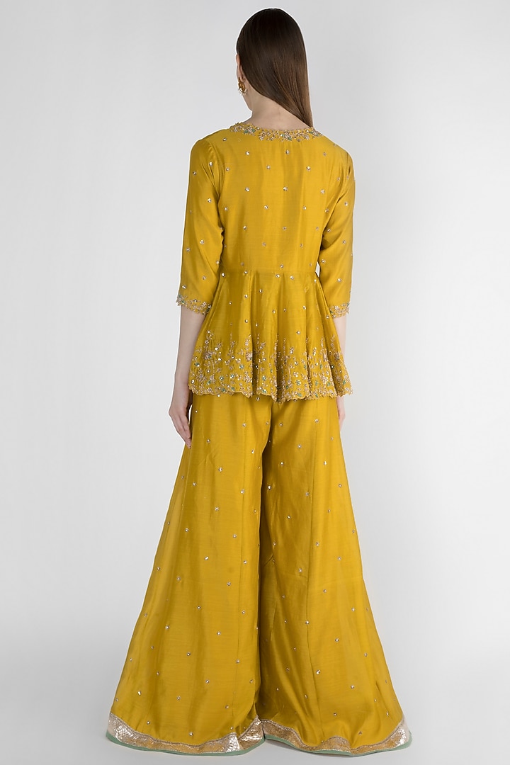 Mustard Yellow Peplum Jacket With Bustier & Flared Pants by Himani And Anjali Shah at Pernia's Pop Up Shop