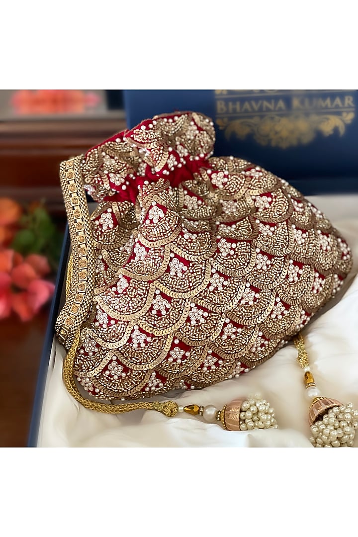 Red Hand Embroidered Potli by BHAVNA KUMAR at Pernia's Pop Up Shop