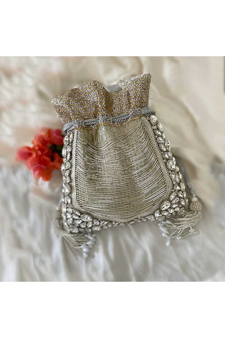 Silver & Bronze Hand Embroidered Potli by BHAVNA KUMAR at Pernia's Pop Up Shop