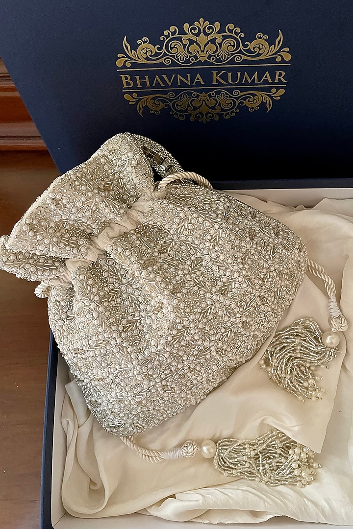 White Hand Embroidered Potli With Handle by BHAVNA KUMAR at Pernia's Pop Up Shop