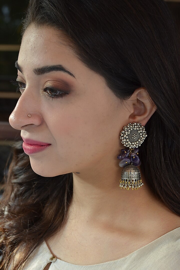 Two Tone Finish Earrings With Purple Stones by Heer-House Of Jewellery