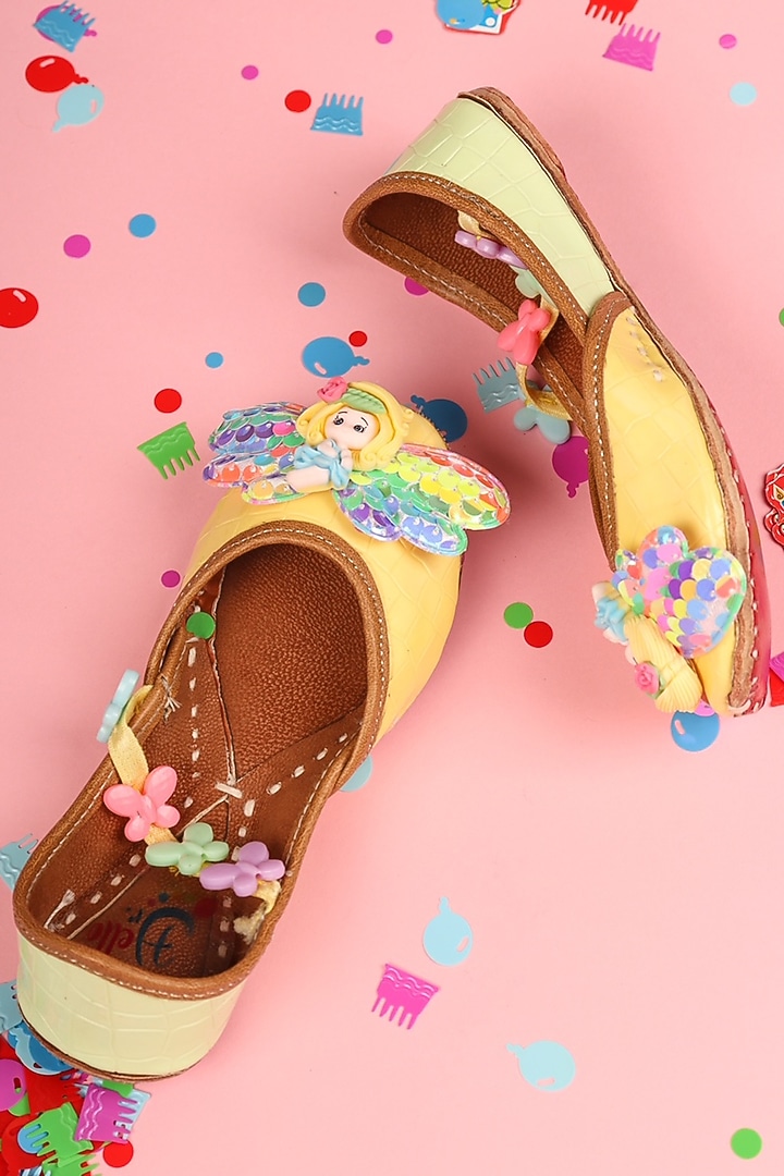 Yellow Leatherette Juttis For Girls by Hello Jr at Pernia's Pop Up Shop