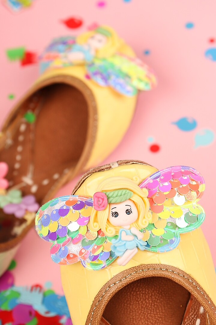Yellow Leatherette Juttis For Girls by Hello Jr at Pernia's Pop Up Shop