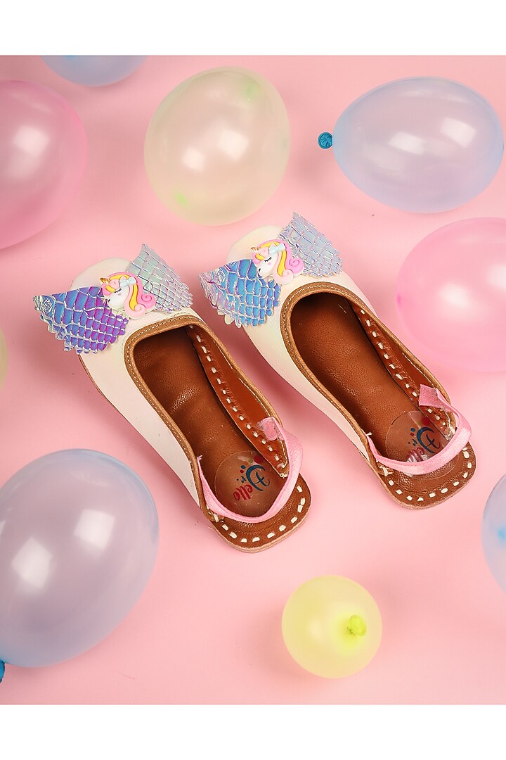 White Leatherette Juttis For Girls by Hello Jr at Pernia's Pop Up Shop