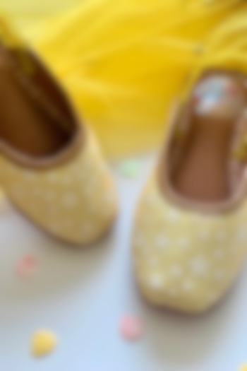 Yellow Printed Leatherette Juttis For Girls by Hello Jr