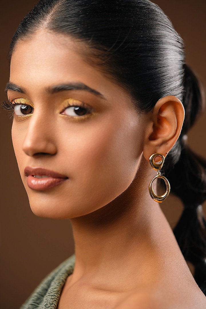 Gold Finish Brass Dangler Earrings by Hermosa By Srishti Bajaj at Pernia's Pop Up Shop