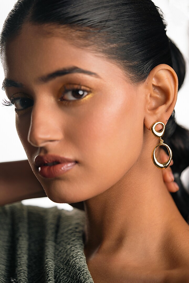 Gold Finish Brass Dangler Earrings by Hermosa By Srishti Bajaj at Pernia's Pop Up Shop