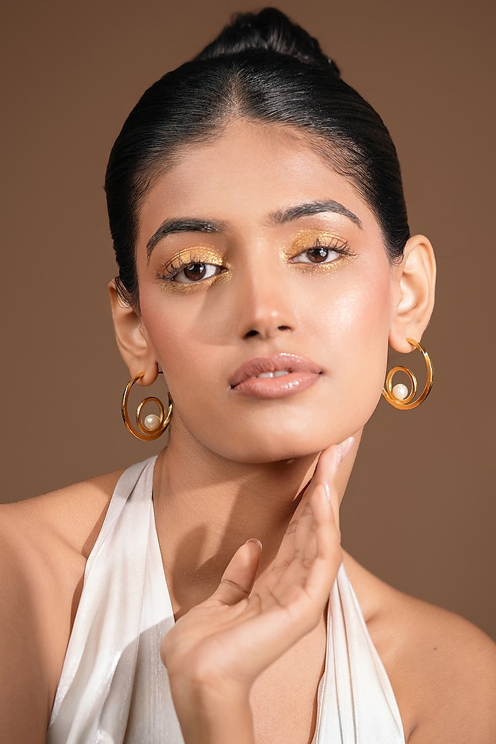 Gold Finish Pearl Hoop Earrings by Hermosa By Srishti Bajaj at Pernia's Pop Up Shop