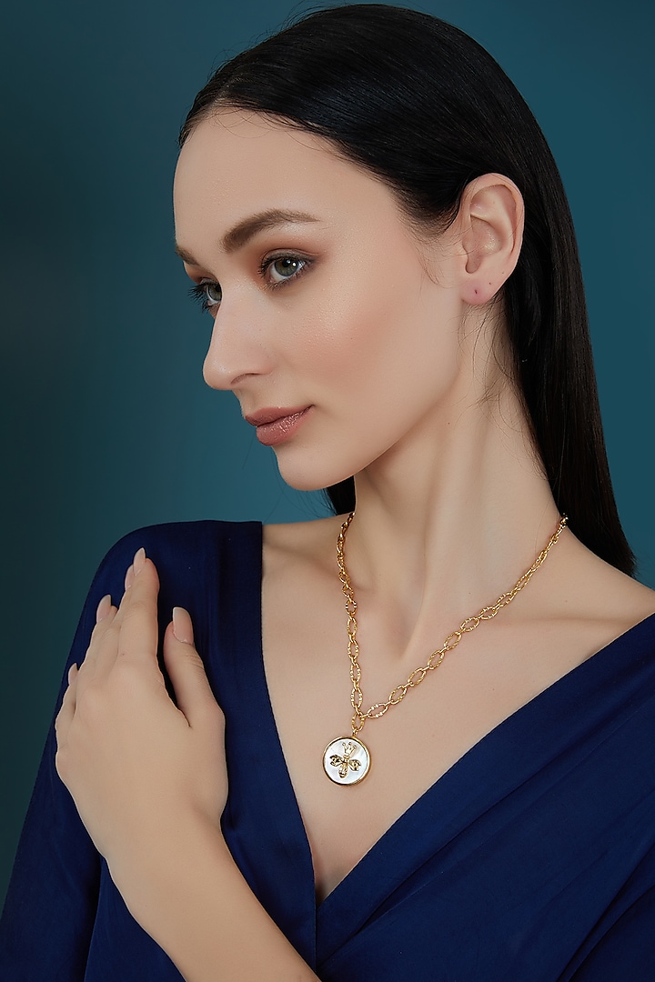 Gold Plated Mother Of Pearl Bee Pendant Necklace by Hermosa By Srishti Bajaj