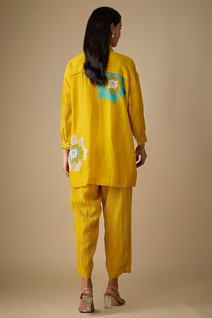 Yellow Fine Chanderi Floral Embroidered Tunic Set by Half Full Curve at Pernia's Pop Up Shop