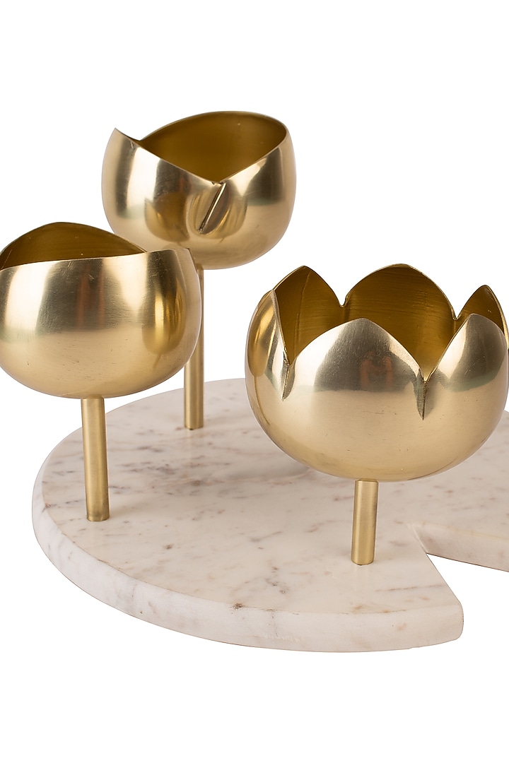 Gold Lotus Bud Shaped Candleholders by H2H at Pernia's Pop Up Shop