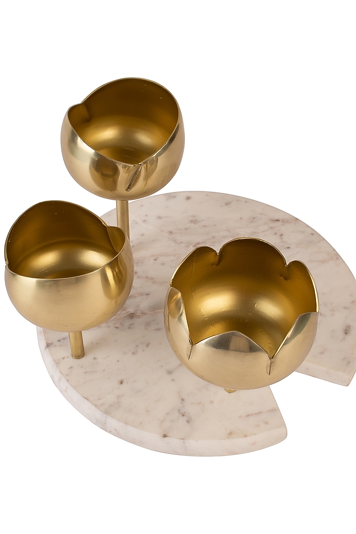 Gold Lotus Bud Shaped Candleholders by H2H at Pernia's Pop Up Shop