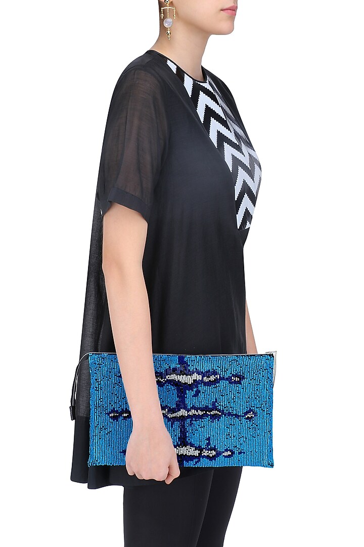Huemn presents Blue and white sequinned leather clutch available only at Pernia's Pop Up Shop.