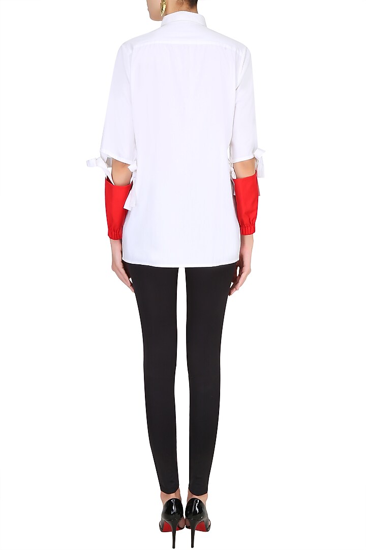 White womens shirt with contrast red forearms available only at Pernia's Pop Up Shop.