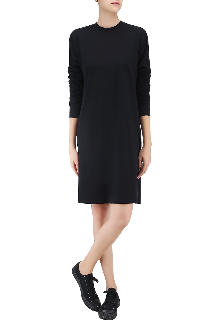 Black t shirt dress available only at Pernia's Pop Up Shop.