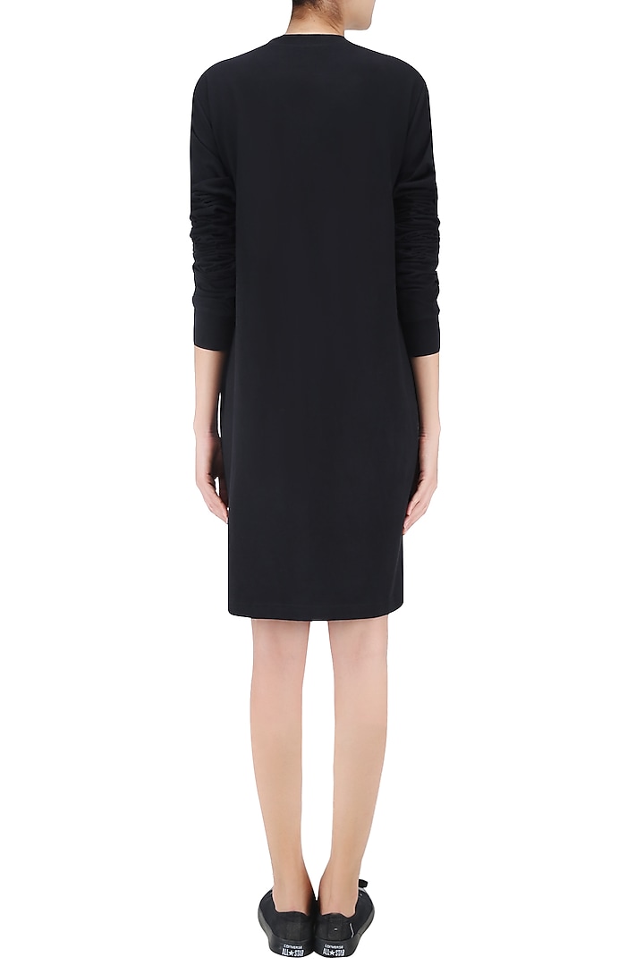 Black t shirt dress available only at Pernia's Pop Up Shop.