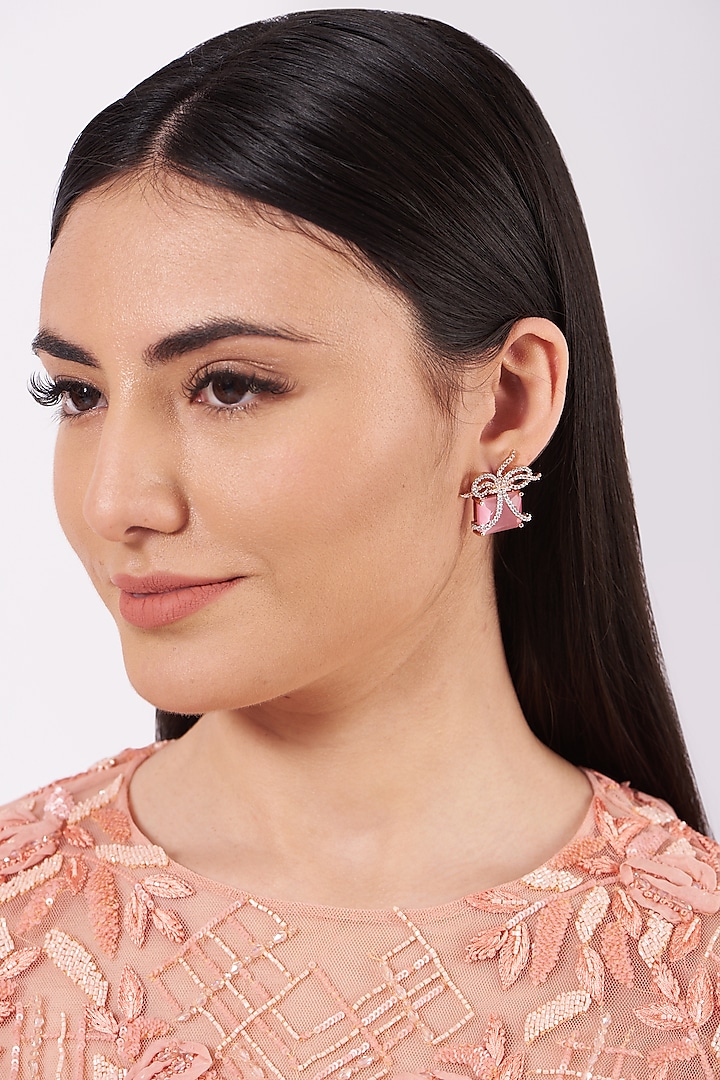 White Finish Stud Earrings With Zircons by House Of Aesha