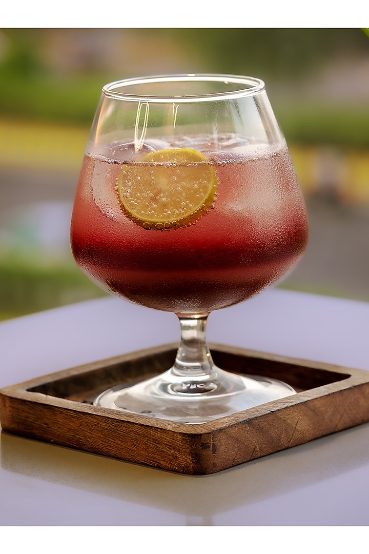 Dark Brown Mango Wood Coaster Set by Hohmgrain at Pernia's Pop Up Shop