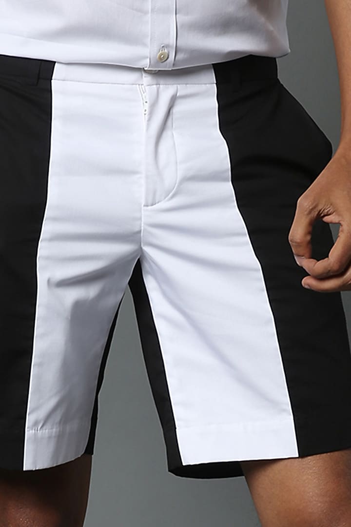 White & Black Color Blocked Shorts by HOUSE OF THREE MEN at Pernia's Pop Up Shop