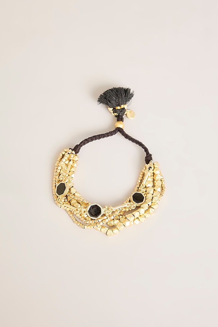 Gold Finish Black Stone Bracelet by House Of Tuhina at Pernia's Pop Up Shop