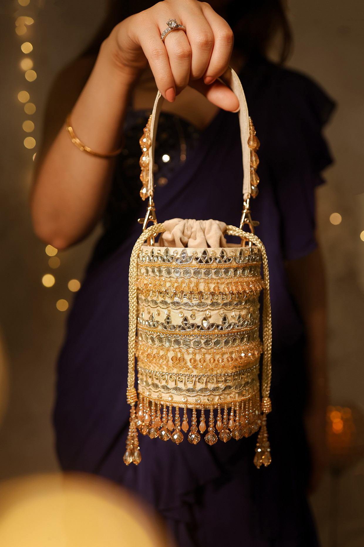 Gold Dupion Mirror Hand Embroidered Bucket Potli Bag by House of Vian at Pernia's Pop Up Shop