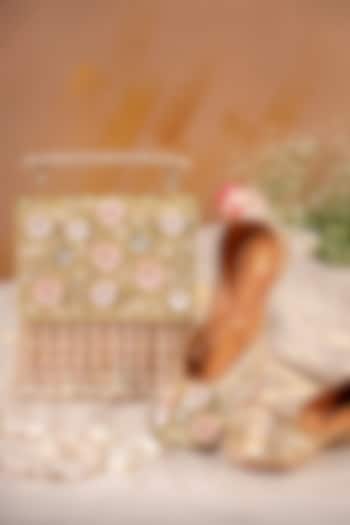 Gold Textured Silk Embellished Jutti & Clutch Set by House of Vian at Pernia's Pop Up Shop