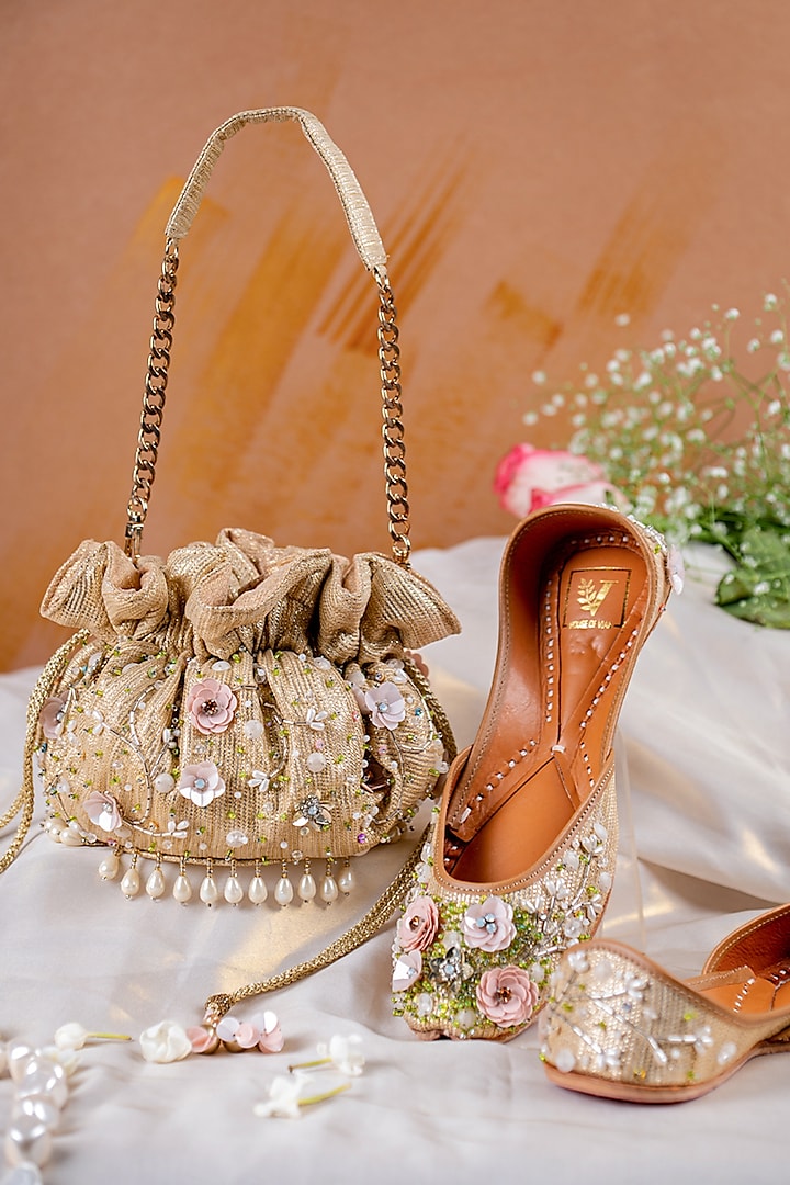 Gold Textured Silk Embroidered Juttis & Clutch Set by House of Vian at Pernia's Pop Up Shop