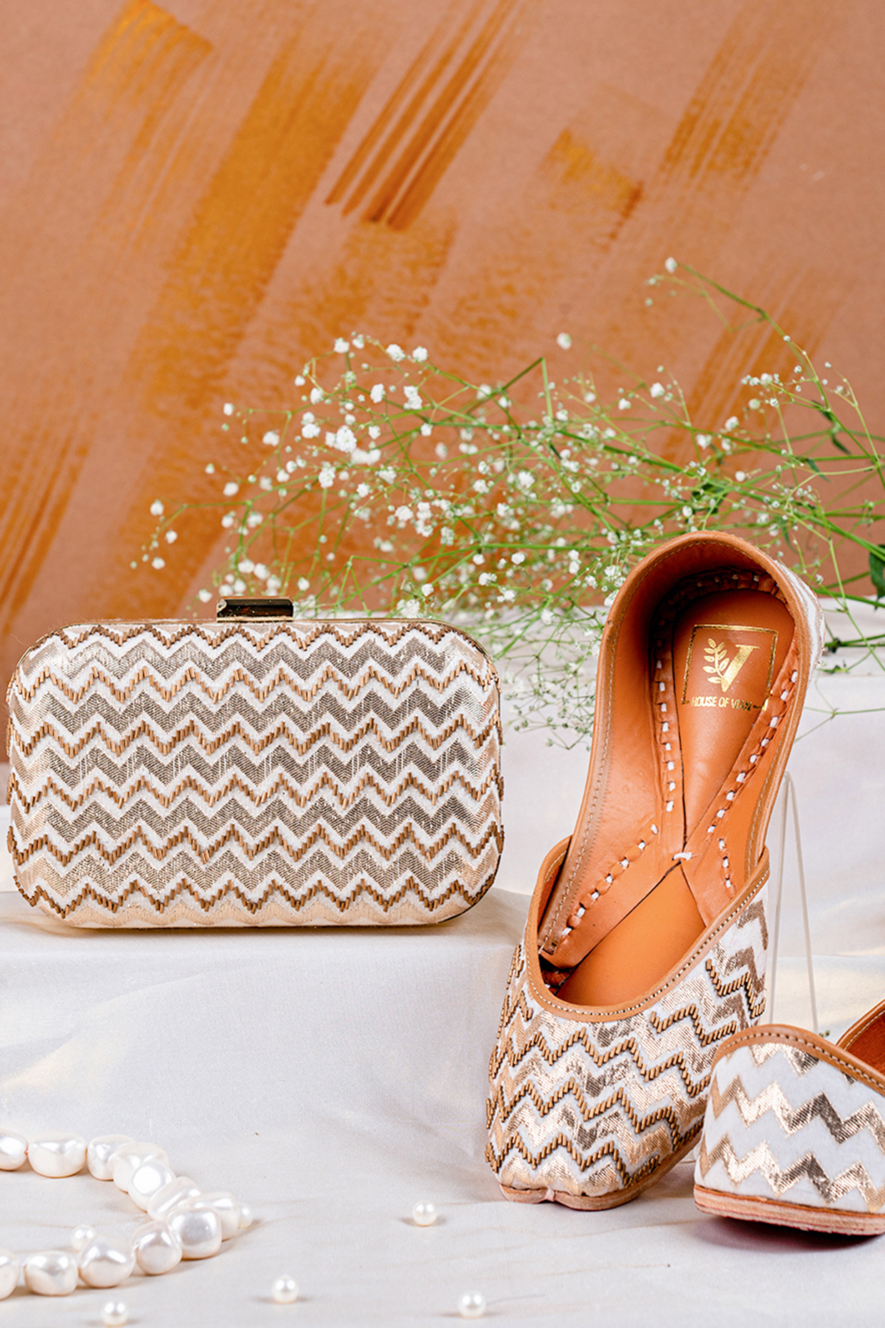 Gold Chanderi Embroidered Juttis & Clutch Set by House of Vian