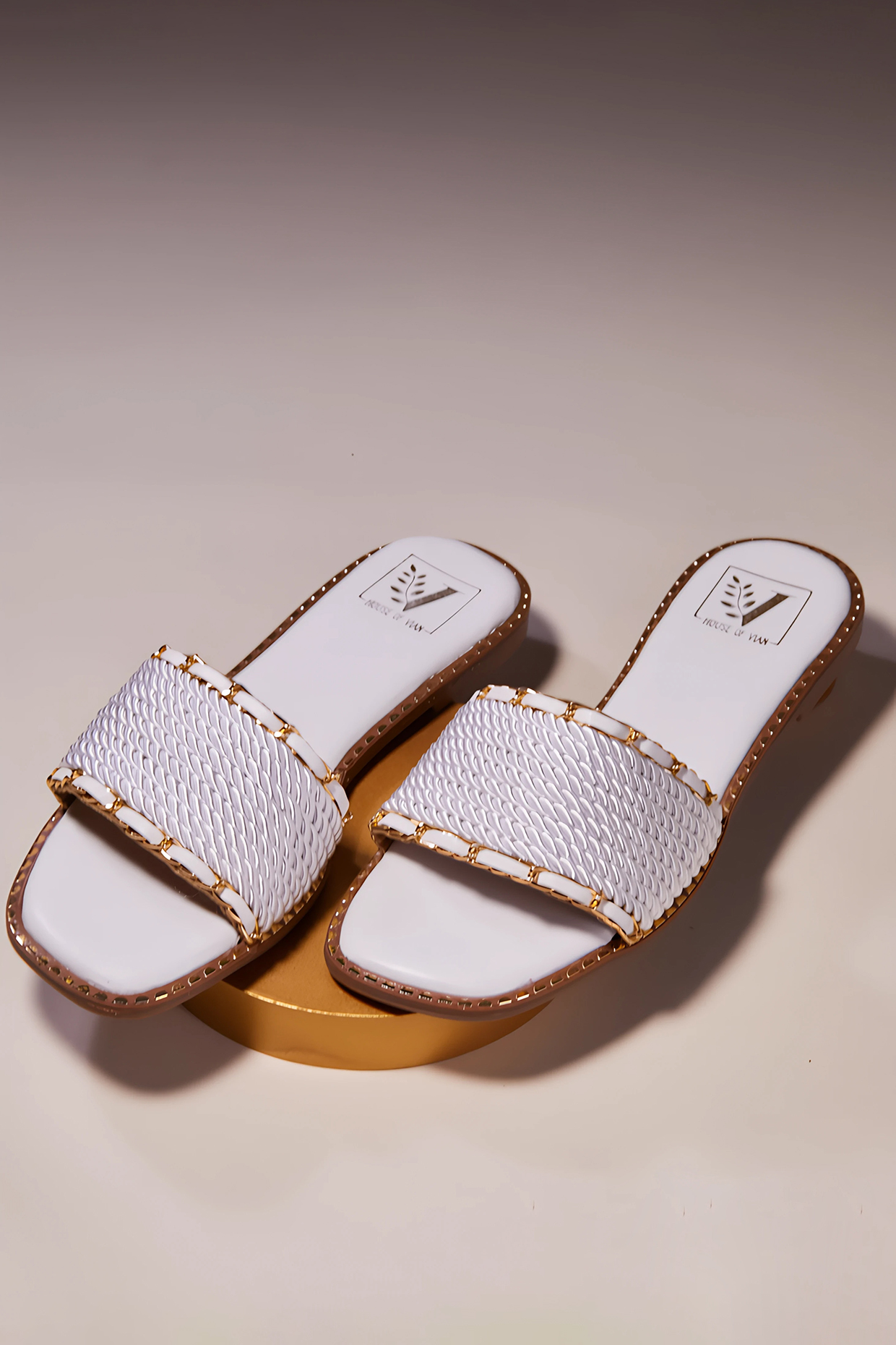 White Synthetic Cord Flats by House of Vian at Pernia's Pop Up Shop