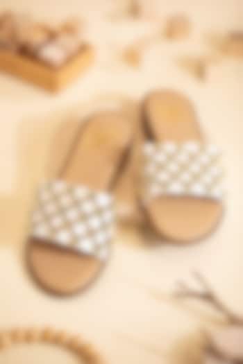 White Faux Leather Cutwork Flats by House of Vian at Pernia's Pop Up Shop