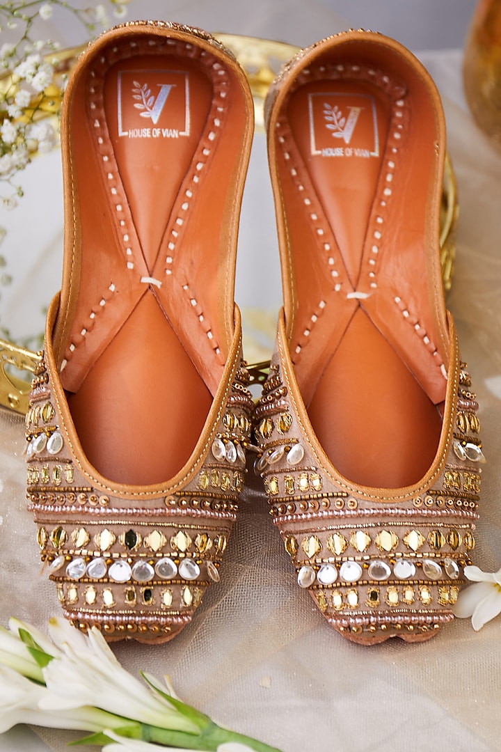 Gold Leatherette & Faux Leather Beads & Sequins Embellished Juttis by House of Vian