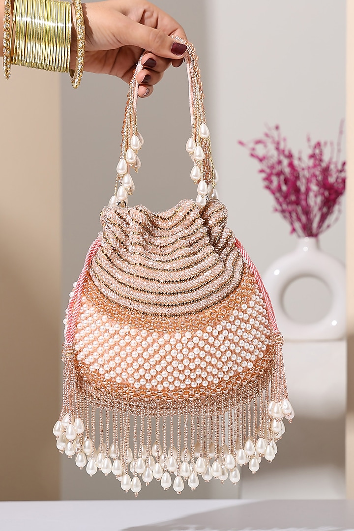 Peach Silk Hand Embroidered Potli by House of Webhin at Pernia's Pop Up Shop