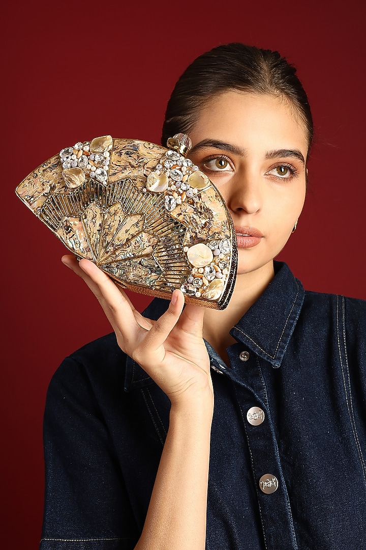 Gold Metal Mother Of Pearl Embellished Fan-Shaped Clutch by House of Webhin at Pernia's Pop Up Shop
