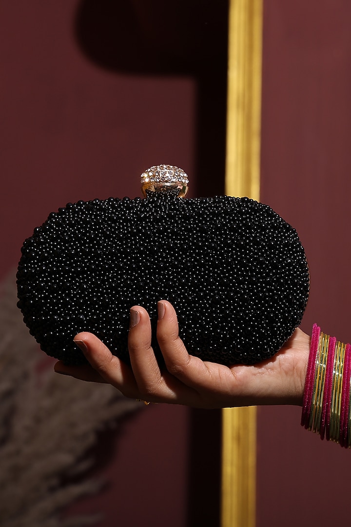 Black Silk Pearl Embellished Clutch by House of Webhin at Pernia's Pop Up Shop
