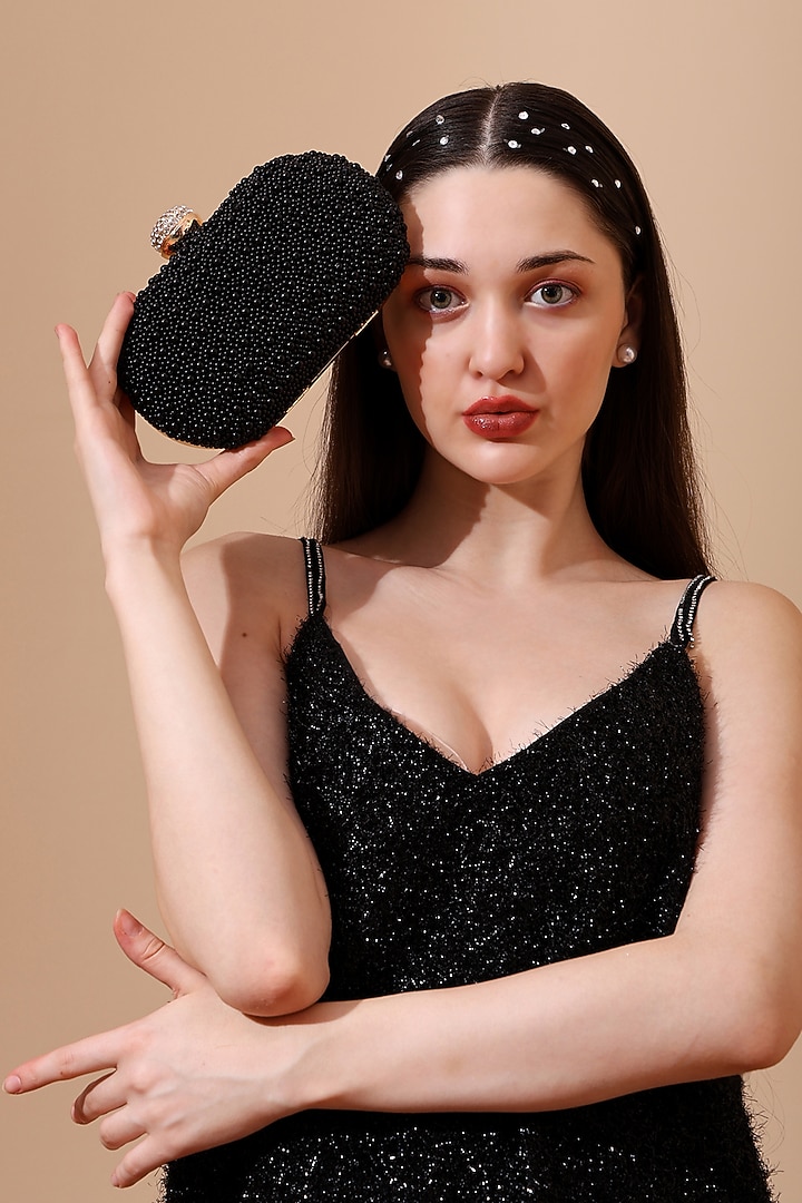 Black Silk Pearl Embellished Clutch by House of Webhin at Pernia's Pop Up Shop