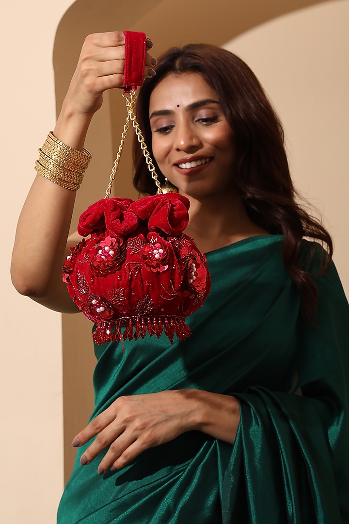 Kumkum Red Velvet Sequin Embellished Potli Bag by House of Webhin at Pernia's Pop Up Shop