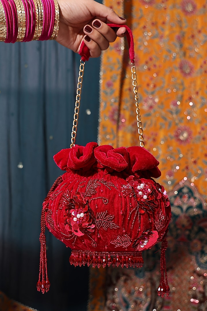 Kumkum Red Velvet Sequin Embellished Potli Bag by House of Webhin at Pernia's Pop Up Shop