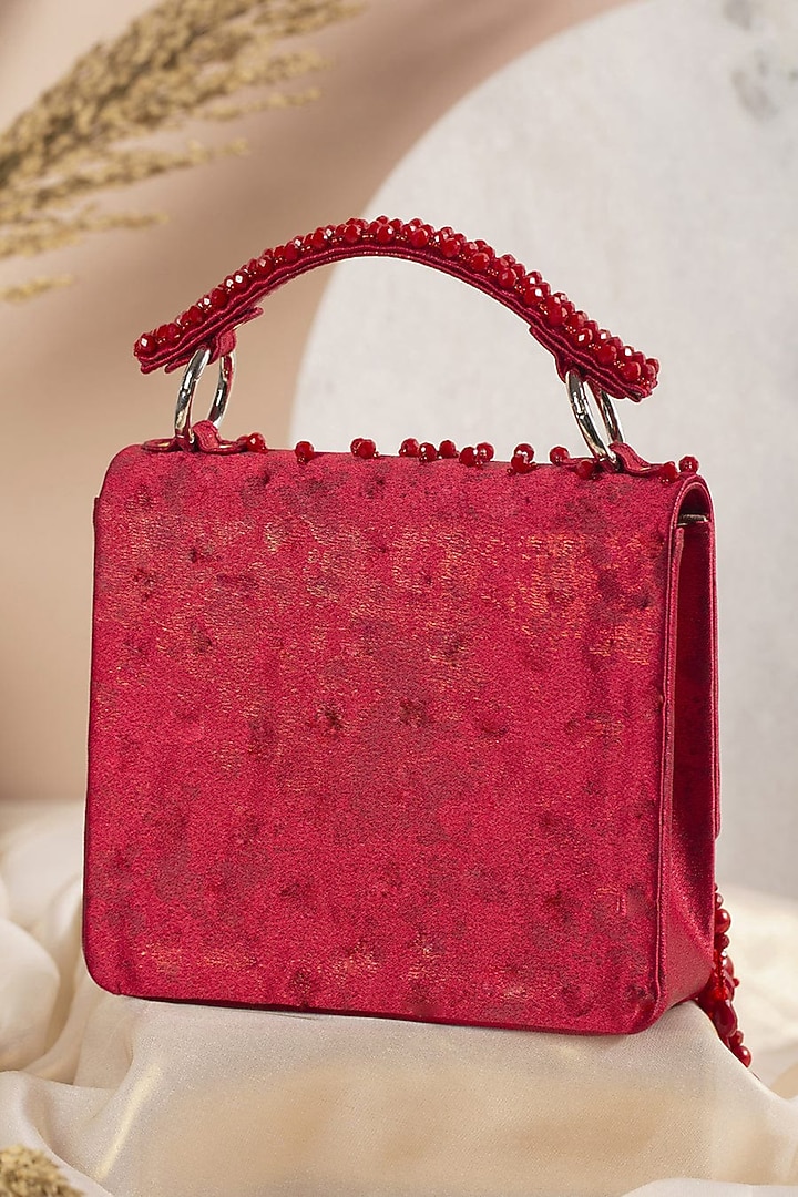 Red Textured Hand Embroidered Clutch by House of Vian at Pernia's Pop Up Shop